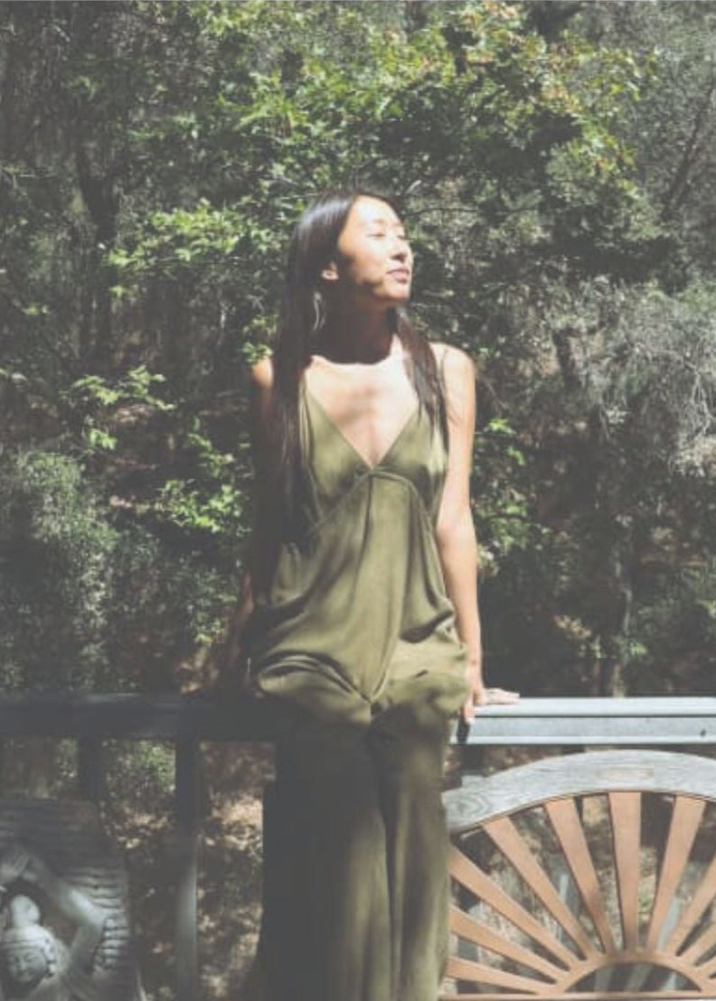 Promotional flyer for Herbal Oracle Readings with Chrissy, featuring a woman standing outdoors.